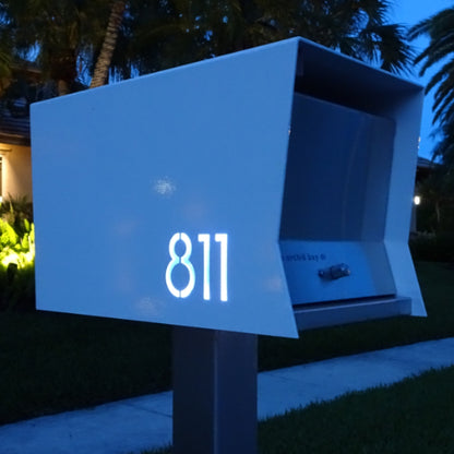 The Original UptownBox in ARCTIC WHITE - Modern Mailbox white at night